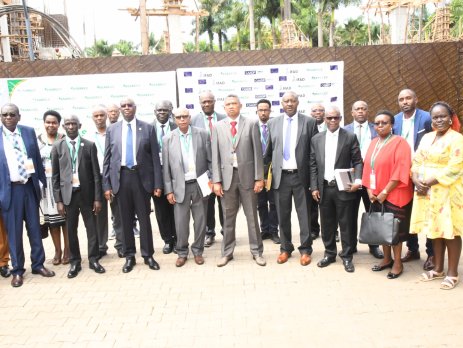 Hon. Rwamirama is joined by some of the delegates at the General Assembly for a group photo